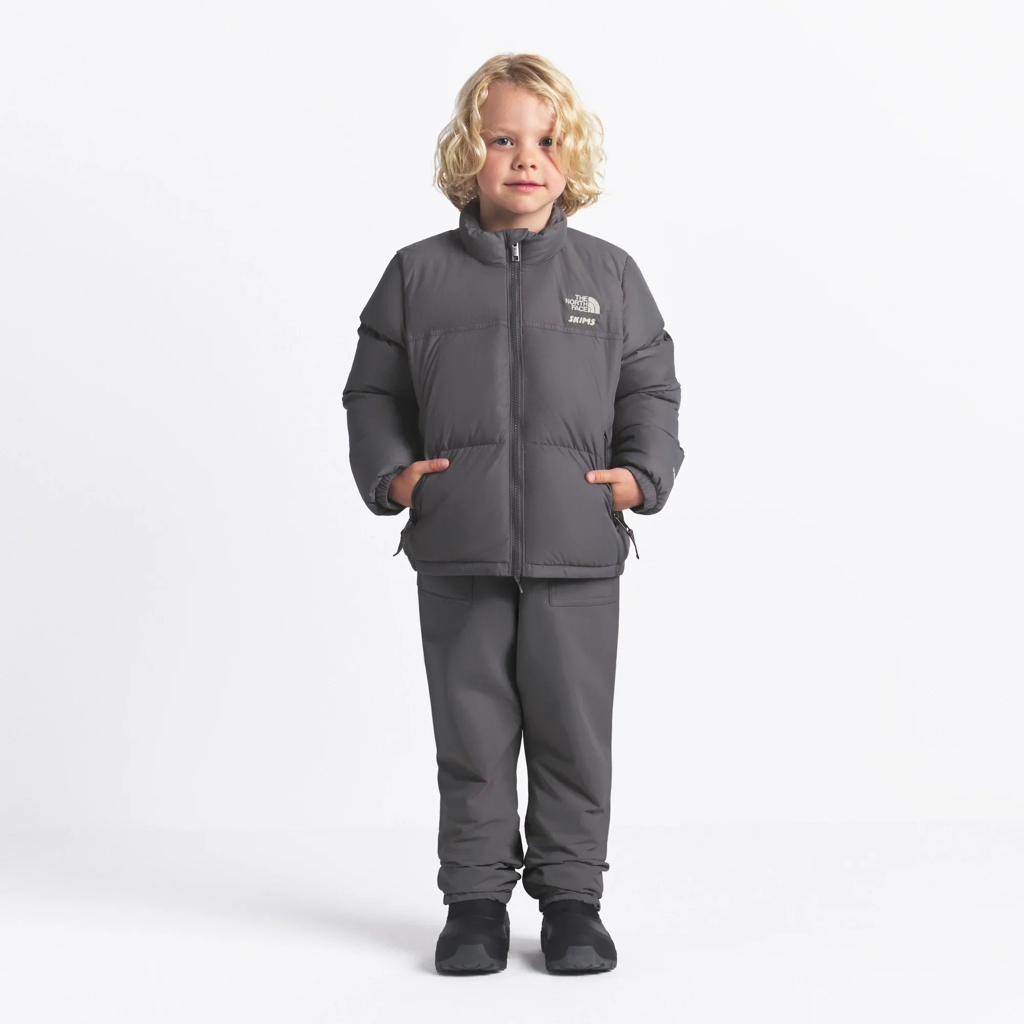 THE NORTH FACE X SKIMS KIDS’ 1996 NUPTSE JACKET | GUNMETAL - Sneaker Türkiye