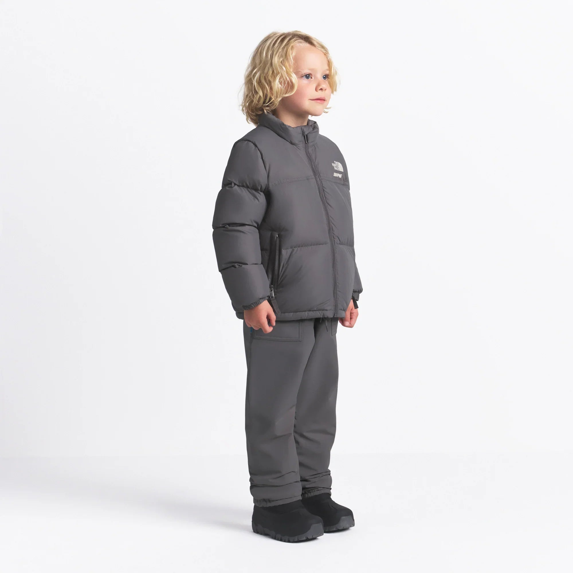 THE NORTH FACE X SKIMS KIDS’ 1996 NUPTSE JACKET | GUNMETAL - Sneaker Türkiye