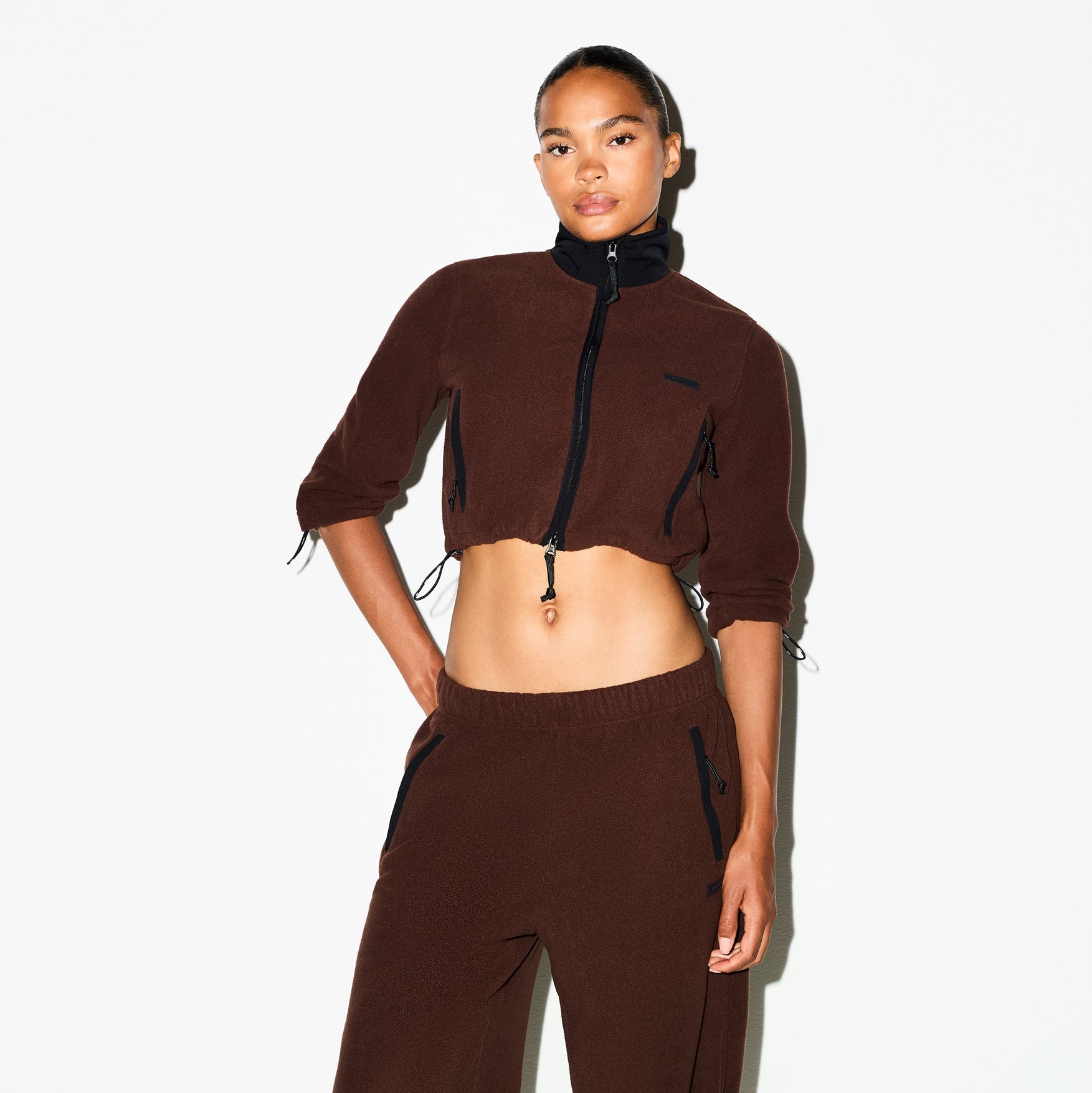 SKIMS OUTDOOR FLEECE CROPPED 3/4 SLEEVE JACKET | COCOA - Sneaker Türkiye